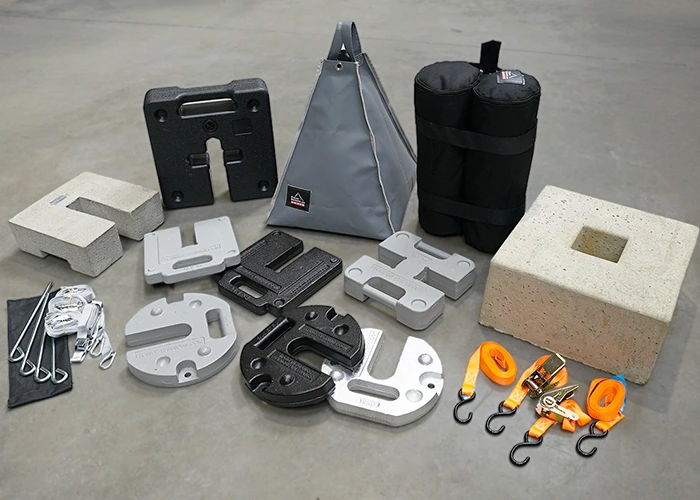 Guide des accessoires pour barnums : lests, poids et arrimages pour sécuriser au maximum son installation
